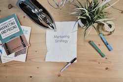 photo-1533750349088-cd871a92f312 working table