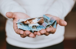 man holding money